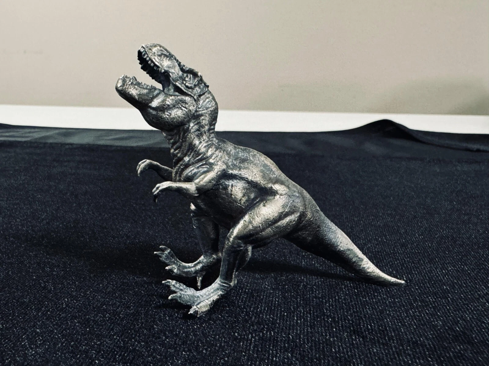 Picture of 2024 Hand Poured T-Rex Dinosaur 100 Gram Silver
