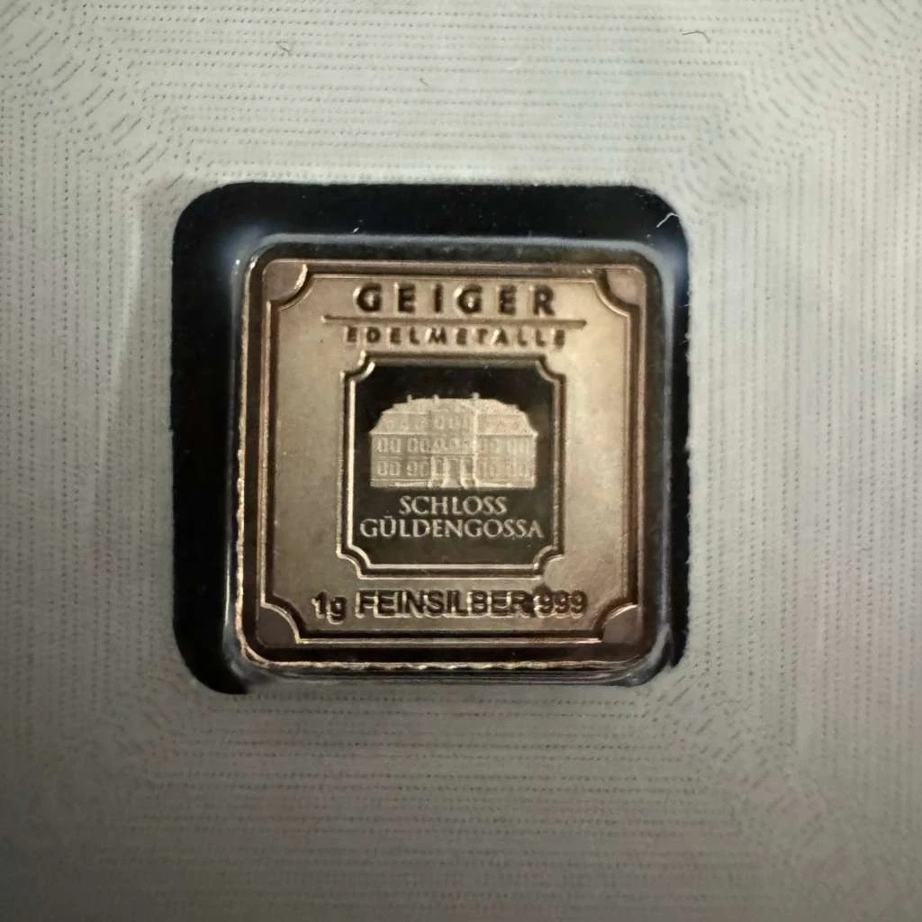 Picture of Geiger Edelmetalle Original 1 Gram Silver Square Naturally Toned -  In Capsule